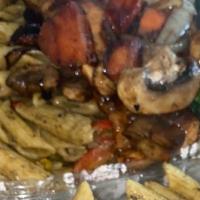 Veggie Dreadlock Pasta · Penne pasta covered with a creamy, spicy Caribbean sauce. Served with side of carrots, brocc...