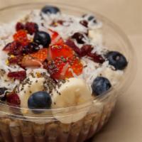 Peanut Butter Acai Bowl · Blended: acai, peanut butter, banana, almond milk. Toppings: granola, almond slice, cranberr...