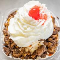 Fat Cow Sundae · Choice of ice cream with hot fudge and peanut butter topping, reeses pieces and reeses peanu...