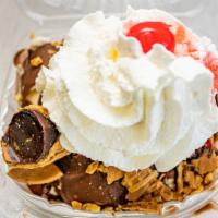 The Drumstick · Vanilla soft ice cream, hard chocolate shell, chopped peanuts and fudge filled sugar cones, ...
