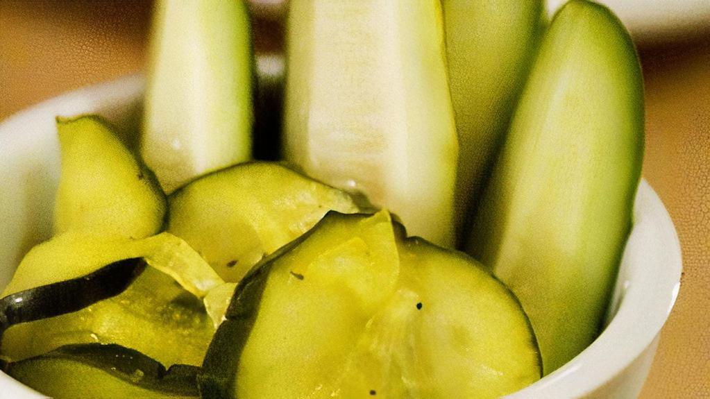 House-Made Pickles · House-made dill and bread & butter pickles.