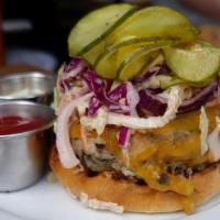 Mushroom Barley Veggie Burger (Lunch) · House-made bread and butter pickles & savoy cabbage slaw on a brioche bun.