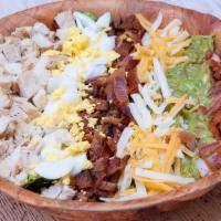 Waylon Cobb Salad · Romaine, grilled chicken, bacon, hard-boiled egg, guacamole, pico de gallo and shredded ques...