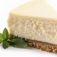 Cheese Cake · New York-Style Cheesecake Slices are thick, creamy.
