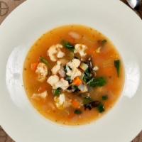 Minestrone · A classic Italian soup of celery, carrots, potatoes, cauliflower, garlic and onion.