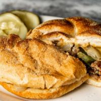 Philly Cheesesteak Sandwich · Comes with onion and green pepper.
