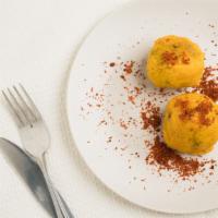 Batata Vada (3 Pcs) · Classic potato fritters consisting of mashed potato in chickpea flour, deep-fried, and serve...