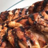 Grilled Baby Chicken · Best seller. With yellow rice.
