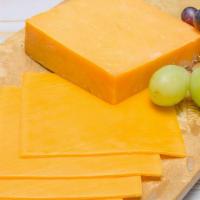 Millers Pre-Sliced Yellow American Cheese · One pound slice.