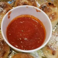 Garlic Knots · Half Dozen. A classic snack, our garlic knots are strips of pizza dough tied in a knot, bake...