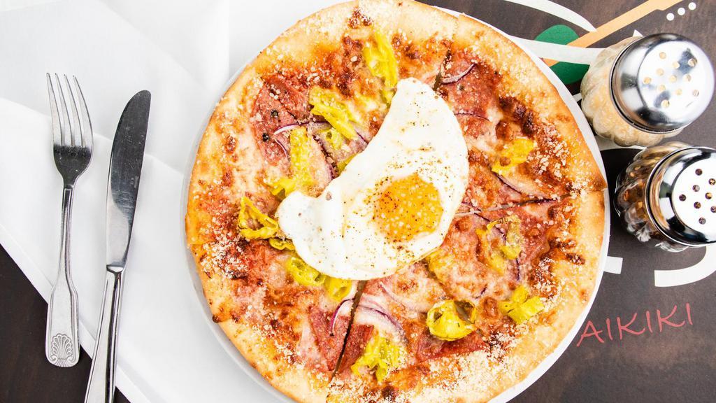 Sunny Salami Pizza · House-made red sauce, Mozzarella, pepperoncini, red onions and salami topped with a sunny side up egg.