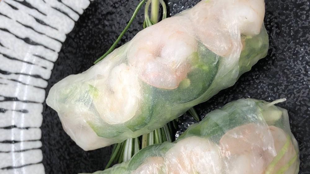 Kuma Rolls · Two rolls. Shrimp, lettuce, jalapeno and creamy miso sauce wrapped with rice wrapper.