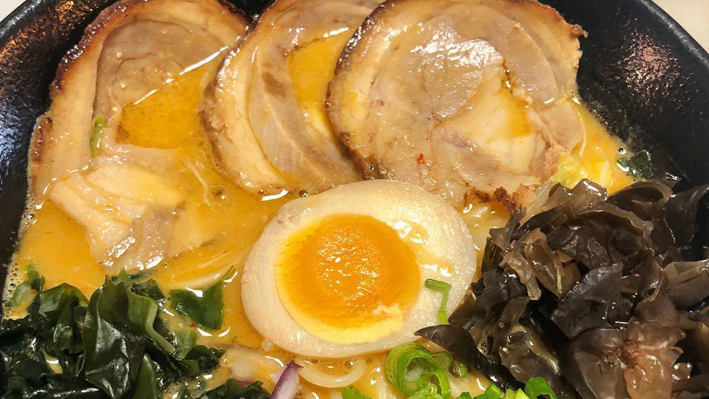 Spicy Miso Ramen · Chicken broth. Napa cabbage, scallion, egg, seaweed, black fungus and onion with miso flavor.