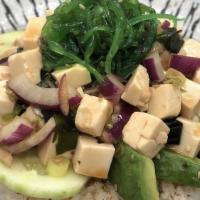 Tofu Poke · Tofu, seaweed, onion, scallion, avocado, seaweed salad and cucumber with vinegar ponzu sauce...