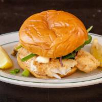 Whiting Fish Sandwich · Fried whiting fish with homemade tartar sauce served on a hot bun