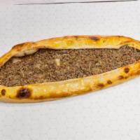 Kiymali Pide · This savory ground lamb is mixed with onions over Turkish pide.