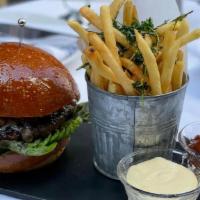 Schilling Burger · Hanger-Brisket Blend, Farmhouse Cheddar, Onion Jam on Brioche with Pommes Frites