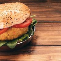 Green Market Veggie Burger · Our Homemade Chickpea Patty with Caraflex Cabbage, Celery Root and Mushrooms,
Topped with Ho...