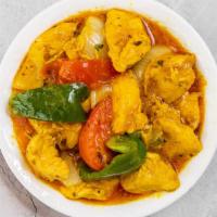 Chicken Curry · Chicken with onion sauce and Indian spices.
