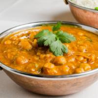 Chana Masala · Garbanzo cooked with onion tomato and spices.