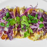 Fish Tacos · Red cabbage, pickled onions, cilantro, chipotle.