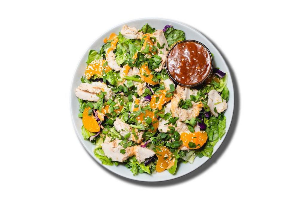 Asian Grilled Chicken Salad · Grilled Chicken, Mandarin Orange, Green Onions, Cilantro, Sesame Seeds & Mandarin Orange Chipotle Sesame Ginger Dressing on Romaine.