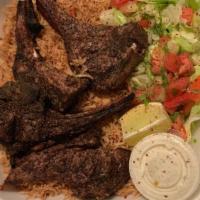 3 Lamb Chops · Three pieces of fresh cut lamb chops marinated in fresh homemade spices, broiled over a char...