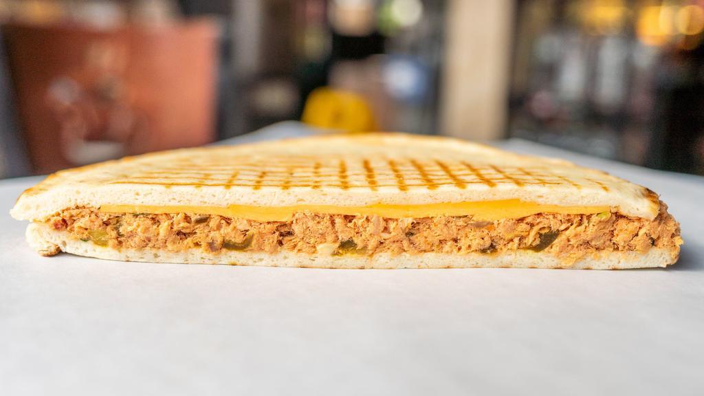 Chicken Fajita Panini · Grilled chicken, cheddar cheese, roasted peppers, caramelized onions and salsa.