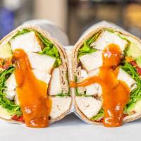 Bbq Wrap · Sliced BBQ chicken breast, avocado, romaine, pepper jack cheese and sun - dried tomatoes on ...