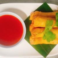 Vegan Spring Roll · with glass noodle. Cabbage, carrot served with homemade sweet sauce