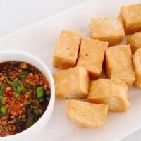 Vegan Fried Tofu · Vegan fried tofu  with peanut plum sauce
