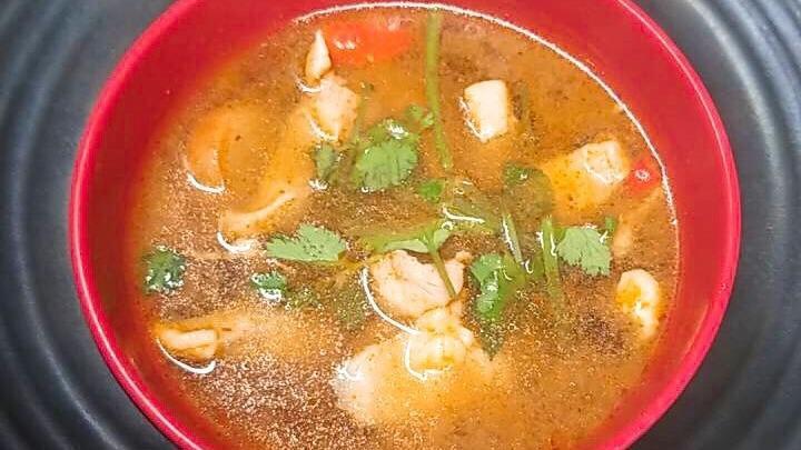 Tom Yum Naam Khon · Spicy sour creamy soup, wild mushroom, galangal, kaffir lime leaves, cilantro and chili paste lemongrass shrimp broth. No soy sauce.
