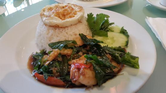 Pad Kra Prao · Wok stir-fried minced chicken or pork, Thai basil, garlic, and chili with Thai basil sauce. Served with rice.
