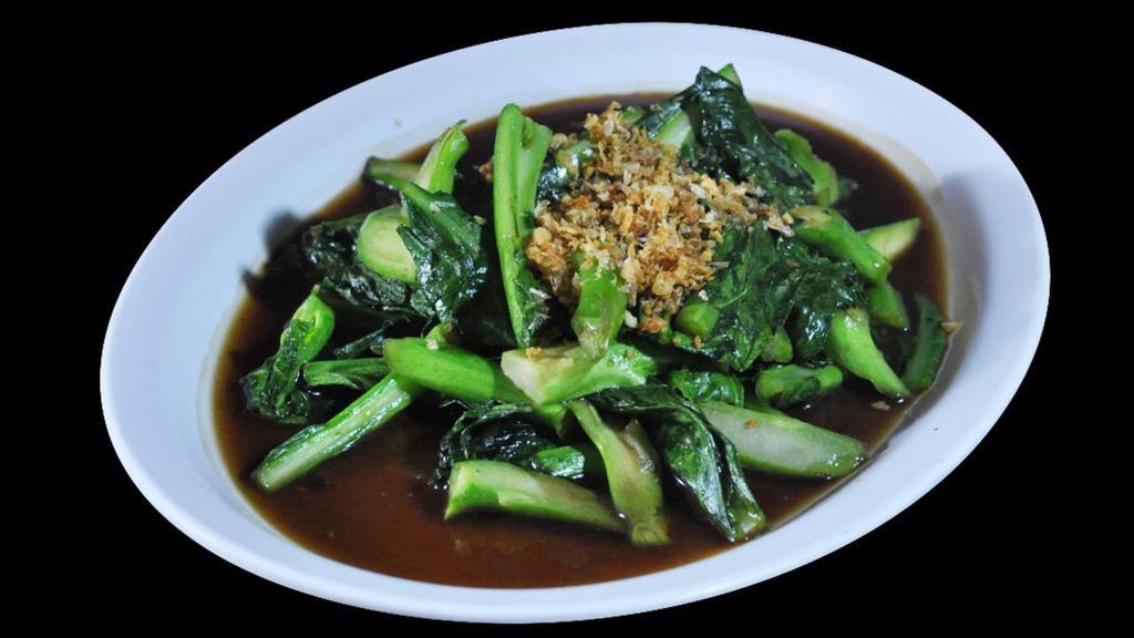Khana Pad Naam Man Hoi · Stir fried Chinese broccoli with garlic, oyster sauce, fish sauce and soy sauce. Served with rice.