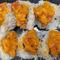 Rose Maki · Crab, Avacado, ,Cucumber, Mayo, Spicy Sauce and Spicy Ahi with Sesame Seeds