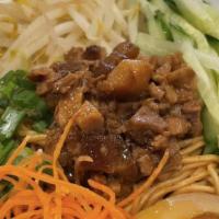 Dan Dan Noodle · Spicy. Straight noodles, scallions, minced pork, bean sprout, cucumber, soft boiled egg, hot...