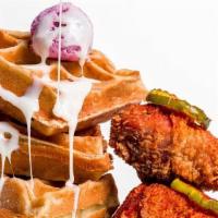 Nashville Hot Chicken & Waffles (Bone-In, Full Waffle) · 2 spicy bone-in pieces of fried chicken paired with a whole waffle. Served with hot sauce, m...
