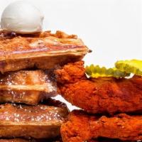 Nashville Chicken Tenders & Waffles · 4 spicy boneless chicken tenders paired with a full waffle. Served with hot sauce, maple syr...