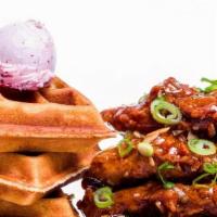 Honey Garlic Chicken Tenders & Waffles · 4 boneless chicken tenders tossed in our warm honey garlic sauce, paired with a full waffle....