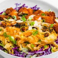 Vegetarian Sesame Ginger Chicken Salad · Chopped greens, Mandarin oranges, fried wontons, scallions, and a sesame vinaigrette dressin...
