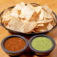 Chips & Salsa · House-made tortilla chips with red and green salsas.