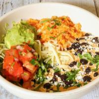 Bean Bowl · Black or refried beans, guacamole, Monterey Jack and cheddar cheese, pico de gallo, cotija c...