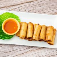 Lumpiang Shanghai · Mixture of vegetable, ground pork and shrimp served with a sweet and sour dipping sauce.

(N...