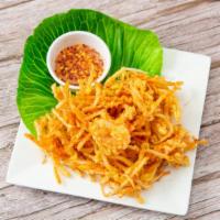 Ukoy (Bean Sprout Fritters) · Bean sprouts with shrimp and vegetables fried with batter and served with vinegar and garlic...