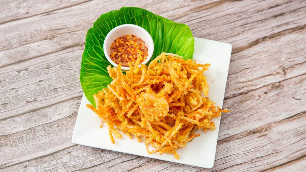 Ukoy (Bean Sprout Fritters) · Bean sprouts with shrimp and vegetables fried with batter and served with vinegar and garlic.

(No Rice)