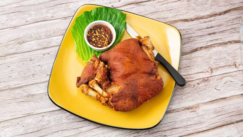 Crispy Pata · Deep fried pork knuckles with ginger and garlic.