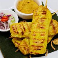 Satay · 4 skewers. Marinated and grilled chicken or grilled beef on skewers with side of peanut sauc...