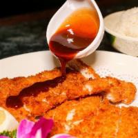 Tonkatsu (Pork Cutlet) · Served with soup, salad, and steamed rice.