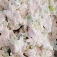 Malibu Chicken Salad · Chopped lettuce, tomato, cucumber, homemade crouton, tossed with honey, dijon dressing, topp...