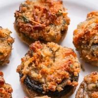 Stuffed Mushrooms · With crabmeat, served in a lemon white wine sauce.